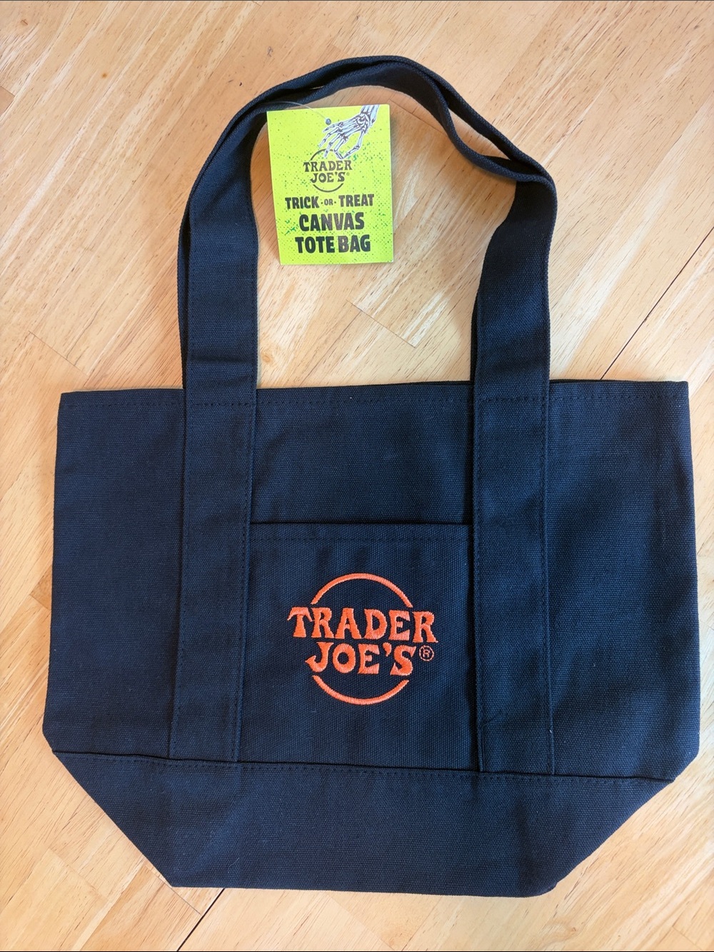 NWT Trader Joe’s Trick or Treat Black Canvas Tote Bag with Orange Logo